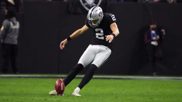 Raiders kicker Daniel Carlson kicks off