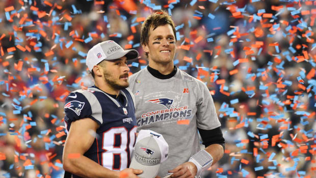 Danny Amendola and Tom Brady pose after winning the AFC championship in 2018.