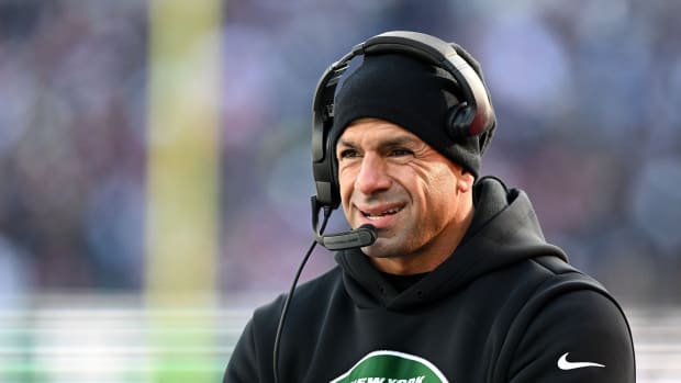 New York Jets head coach Robert Saleh smiles on sideline