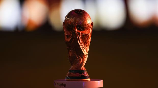 The World Cup trophy sits on on a stand before the final of France vs. Argentina.