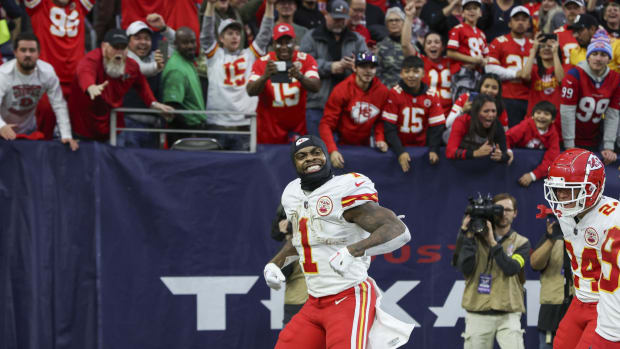 Chiefs running back Jerick McKinnon celebrates after his game-winning touchdown run in overtime beat the Texans.