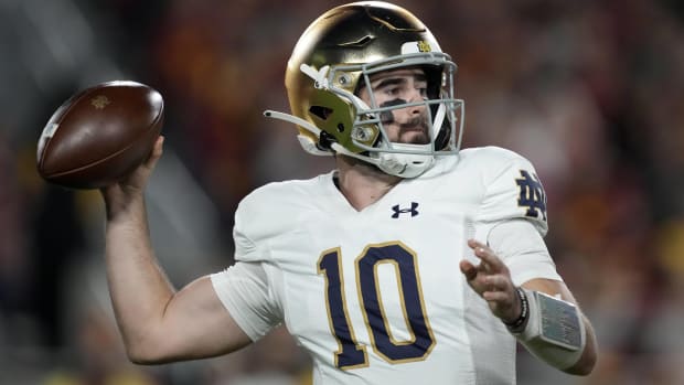 Notre Dame quarterback Drew Pyne  throws a pass in a game vs. USC.