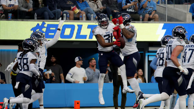 Tennessee Titans safety Kevin Byard (31) celebrates after intercepting a pass during the third quarter against the Los Angeles Chargers at SoFi Stadium.