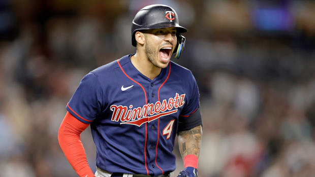 Twins shortstop Carlos Correa reacts after hitting a two-run home run against the Yankees during the eighth inning of a game Thursday, Sept. 8, 2022, in New York.