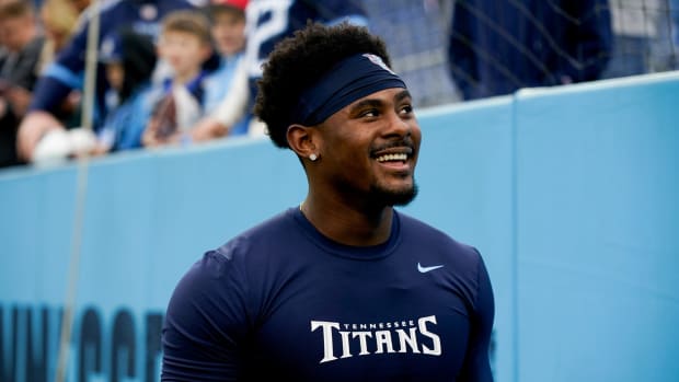 Tennessee Titans quarterback Malik Willis (7) smiles at fans as the team gets ready to face the Jacksonville Jaguars at Nissan Stadium Sunday, Dec. 11, 2022, in Nashville, Tenn.