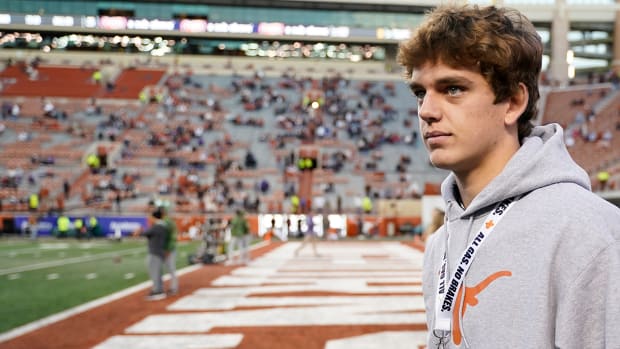 Longhorns quarterback recruit Arch Manning on the sidelines before the game against the TCU at Darrell K Royal-Texas Memorial Stadium.