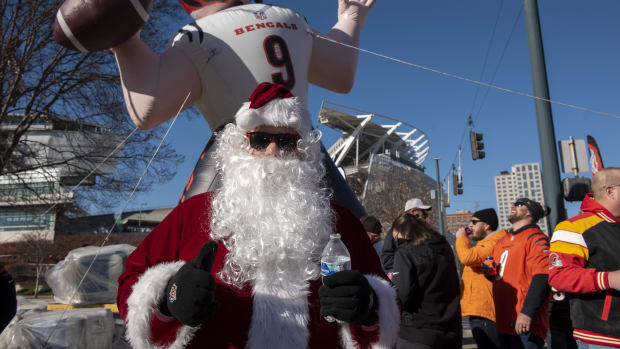 It's game day, Dec. 4, 2022, and the Cincinnati Bengals (7-4) vs. the Kansas City Chiefs (9-2). Thousands of Bengals fans flooded the lots around Paycor Stadium for tailgating parties along with fans from KC. Santa showed up in Lot E for the Bengal Jim \"Before the Roar\" tailgate party.