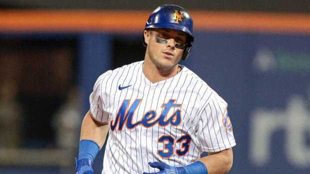 James McCann runs the bases for the Mets.