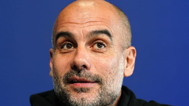 Manchester City manager Pep Guardiola pictured at a press conference in December 2022