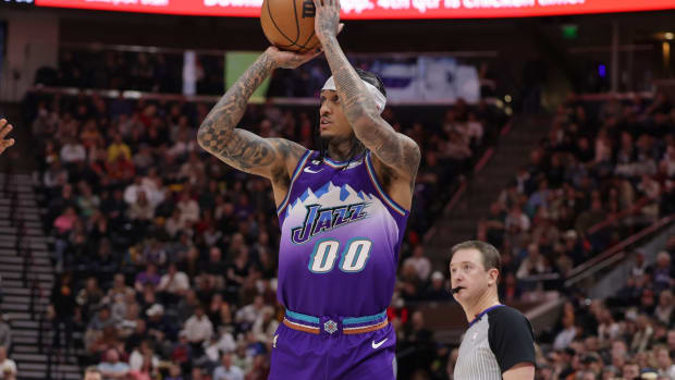 Utah Jazz guard Jordan Clarkson (00) shoots the ball against the Washington Wizards during the second quarter at Vivint Arena.