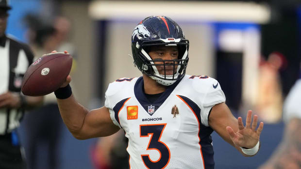 Denver Broncos quarterback Russell Wilson (3) throws against the Los Angeles Rams during the first half at SoFi Stadium.