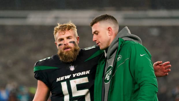New York Jets QB Mike White with Chris Streveler after loss