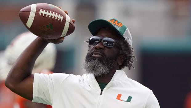 Miami Hurricanes senior football advisor Ed Reed stands on the field prior to the game between the Miami Hurricanes and the Middle Tennessee Blue Raiders at Hard Rock Stadium.
