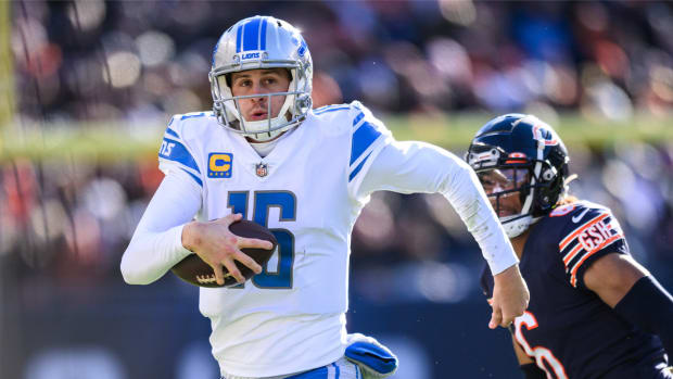 Nov 13, 2022; Chicago, Illinois, USA; Detroit Lions quarterback Jared Goff (16) runs the ball in the fourth quarter against the Chicago Bears at Soldier Field.