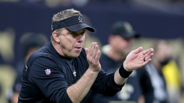 New Orleans Saints head coach Sean Payton claps during pregame warm ups before their game against the Carolina Panthers at the Caesars Superdome.