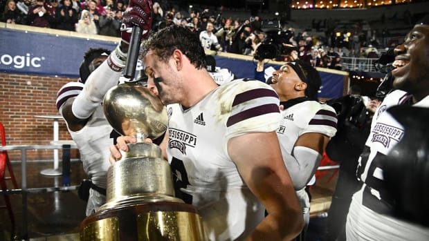 Nov 24, 2022; Oxford, Mississippi, USA; Mississippi State Bulldogs quarterback Will Rogers (2) celebrates with teammates and fans after the game against the Ole Miss Rebels at Vaught-Hemingway Stadium.