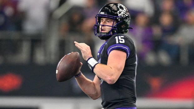 Dec 3, 2022; Arlington, TX, USA; TCU Horned Frogs quarterback Max Duggan (15) drops back to pass against the Kansas State Wildcats during the first quarter at AT&T Stadium.