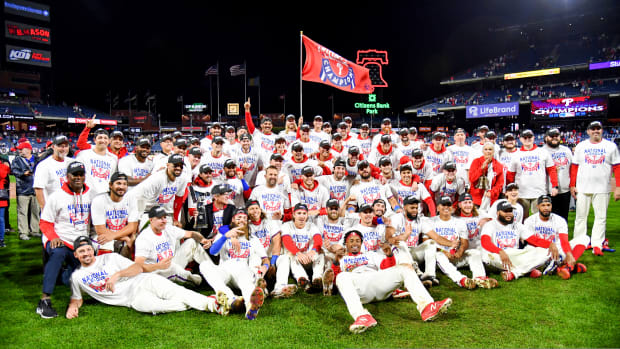 Phillies players pose for a team photo after winning the National League pennant to advance to the World Series.