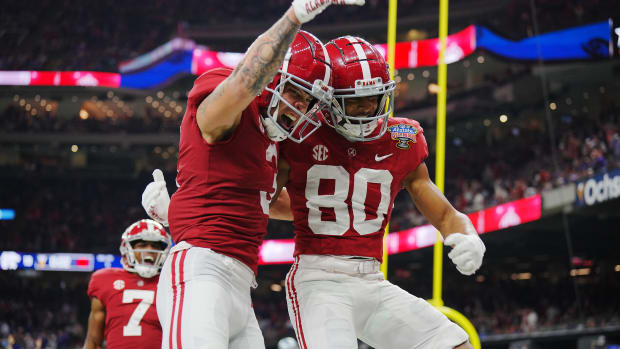 Alabama Crimson Tide wide receiver Kobe Prentice (80) celebrates his touchdown scored against the Kansas State Wildcats with wide receiver Jermaine Burton (3) during the second half in the 2022 Sugar Bowl at Caesars Superdome.