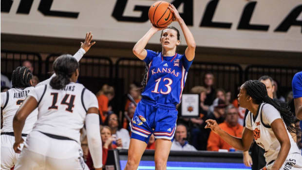 Kansas Jayhawks senior guard Holly Kersgieter takes a shot against the Oklahoma State Cowgirls in the Big 12 opener in Stillwater, OK.