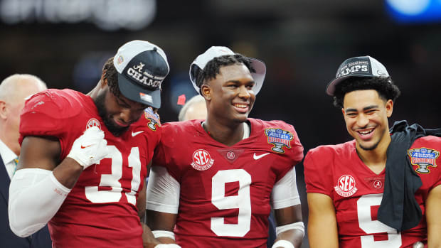 Alabama Crimson Tide linebacker Will Anderson Jr. (31) defensive back Jordan Battle (9) and quarterback Bryce Young (9) celebrate the victory against the Kansas State Wildcats in the 2022 Sugar Bowl at Caesars Superdome.