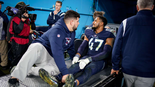 Tennessee Titans safety Andrew Adams (47) is carted off after an injury during the fourth quarter against the Dallas Cowboys at Nissan Stadium Thursday, Dec. 29, 2022, in Nashville, Tenn.