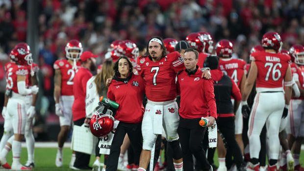 Utah Utes quarterback Cameron Rising (7) walks with assistance off the field in the second half against the Penn State Nittany Lions of the 109th Rose Bowl game at the Rose Bowl.
