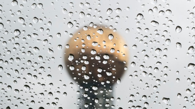 The Sunsphere is seen behind raindrops on a car window on a rainy afternoon in Knoxville, Tenn., on Thursday, Dec. 8, 2022. Kns Rain