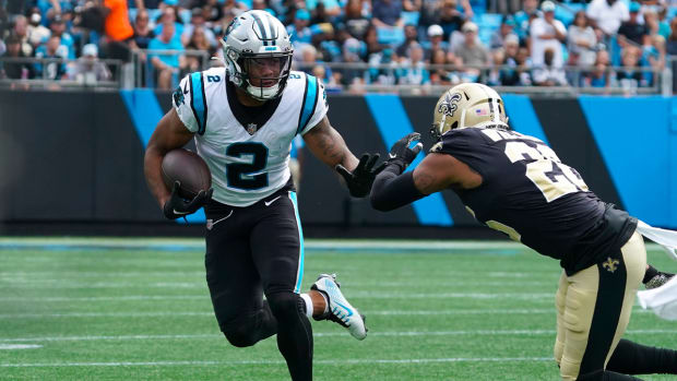 Sep 25, 2022; Charlotte, North Carolina, USA; Carolina Panthers wide receiver DJ Moore (2) runs with the ball after a catch against the New Orleans Saints during the third quarter at Bank of America Stadium.