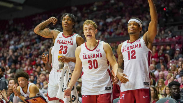 Alabama Crimson Tide bench reacts to a shot during the second half at Coleman Coliseum.