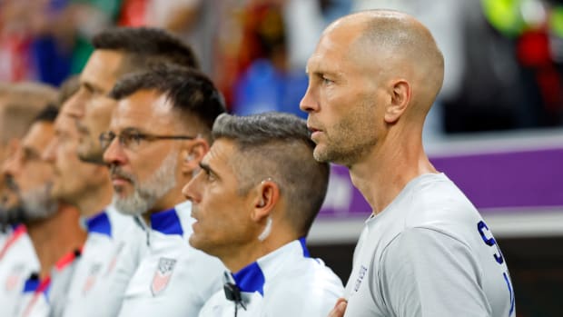USMNT manager Gregg Berhalter looks on during the national anthem before a game.