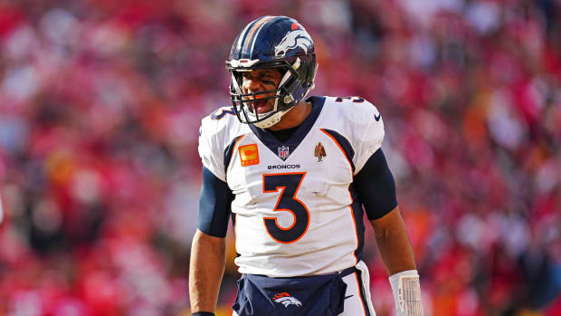 Denver Broncos quarterback Russell Wilson (3) celebrates after a touchdown during the second half against the Kansas City Chiefs at GEHA Field at Arrowhead Stadium.