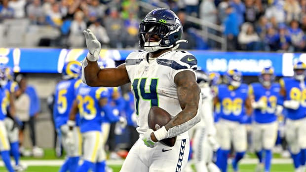 Dec 4, 2022; Inglewood, California, USA; Seattle Seahawks wide receiver DK Metcalf (14) celebrates after a touchdown in the fourth quarter against the Los Angeles Rams at SoFi Stadium.