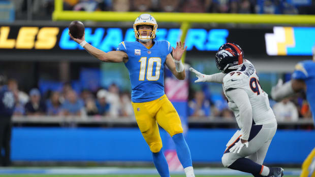 Oct 17, 2022; Inglewood, California, USA; Los Angeles Chargers quarterback Justin Herbert (10) throws the ball in the second half against the Denver Broncos at SoFi Stadium. Mandatory Credit: Kirby Lee-USA TODAY Sports