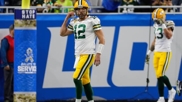 Nov 6, 2022; Detroit, Michigan, USA; Green Bay Packers quarterback Aaron Rodgers (12) walks off the field after a pass was intercepted by Detroit Lions during the first half at Ford Field. Mandatory Credit: Junfu Han-USA TODAY Sports