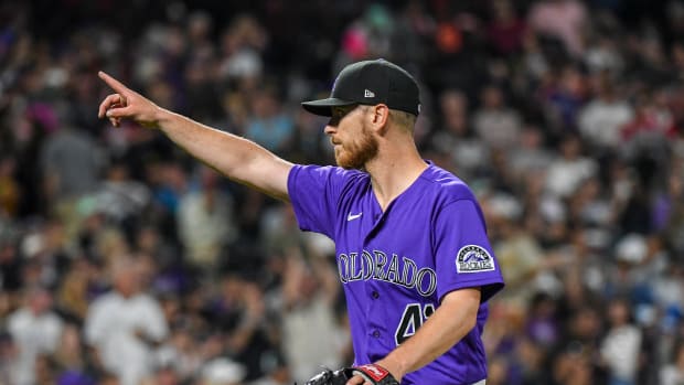 Sep 24, 2022; Denver, Colorado, USA; Colorado Rockies starting pitcher Chad Kuhl (41) points to the crowd after leaving the game in the sixth inning against the San Diego Padres Coors Field. Mandatory Credit: John Leyba-USA TODAY Sports