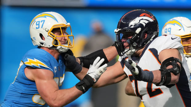 Jan 2, 2022; Inglewood, California, USA; Los Angeles Chargers defensive end Joey Bosa (97) attempts to get past Denver Broncos offensive tackle Garett Bolles (72) in the first half at SoFi Stadium. Mandatory Credit: Kirby Lee-USA TODAY Sports