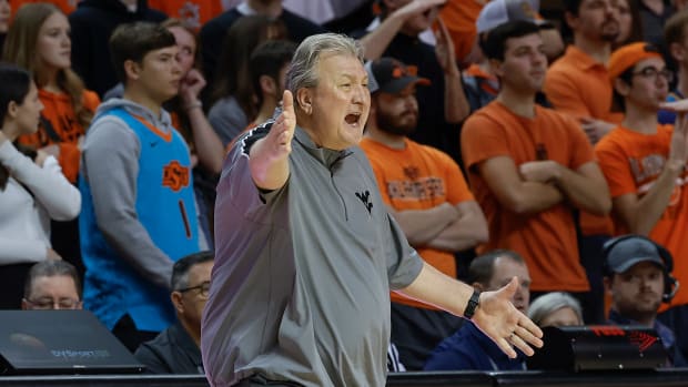 Jan 2, 2023; Stillwater, Oklahoma, USA; West Virginia Mountaineers head coach Bob Huggins gestures to his team on a play against the Oklahoma City Cowboys during the second half at Gallagher-Iba Arena. Oklahoma State won 67-60. Mandatory Credit: Alonzo Adams-USA TODAY Sports