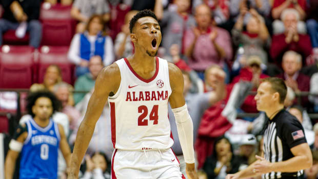 Alabama Crimson Tide forward Brandon Miller (24) reacts a after a play against the Kentucky Wildcats during first half at Coleman Coliseum.