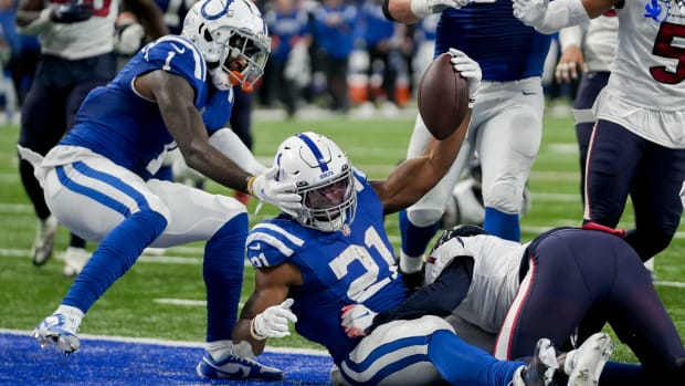 Indianapolis Colts running back Zack Moss (21) celebrates in the end zone after rushing for a touchdown Sunday, Jan. 8, 2023, during a game against the Houston Texans at Lucas Oil Stadium in Indianapolis.