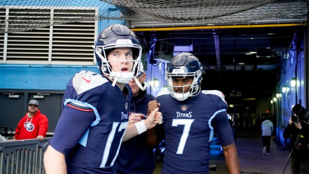 Tennessee Titans quarterbacks Ryan Tannehill (17) and Malik Willis (7) head to the field as the team gets ready to face the Jacksonville Jaguars at Nissan Stadium Sunday, Dec. 11, 2022, in Nashville, Tenn.