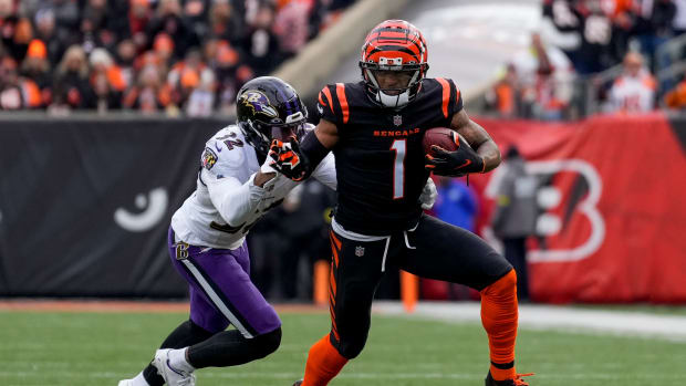 Cincinnati Bengals wide receiver Ja'Marr Chase (1) breaks away from Baltimore Ravens safety Marcus Williams (32) on a reception in the first quarter of the NFL Week 18 game between the Cincinnati Bengals and the Baltimore Ravens at Paycor Stadium in downtown Cincinnati on Sunday, Jan. 8, 2023. The Bengals led 24-7 at halftime. Baltimore Ravens At Cincinnati Bengals Nfl Week 18