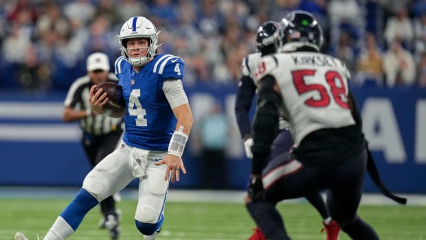 Indianapolis Colts quarterback Sam Ehlinger (4) rushes the ball Sunday, Jan. 8, 2023, during a game against the Houston Texans at Lucas Oil Stadium in Indianapolis.