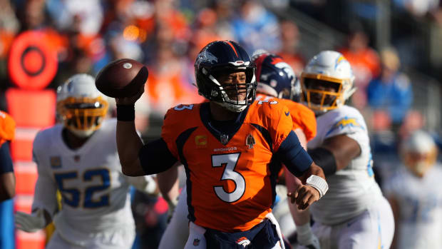 Denver Broncos quarterback Russell Wilson (3) prepares to pass in the first quarter against the Los Angeles Chargers at Empower Field at Mile High.