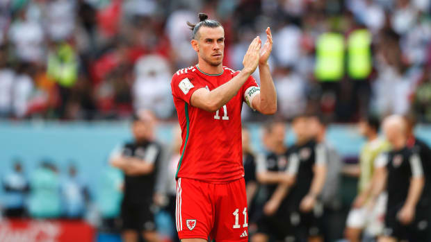 Gareth Bale applauding the crowd.