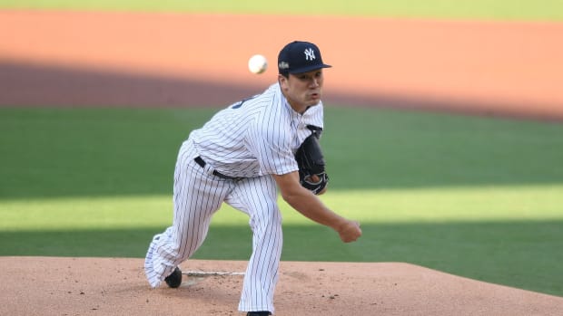 New York Yankees SP Masahiro Tanaka throws pitch in playoffs