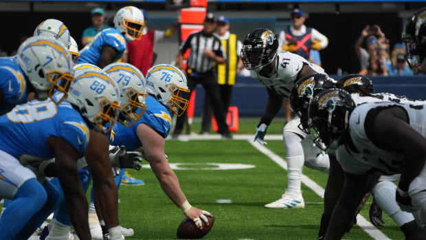 Sep 25, 2022; Inglewood, California, USA; A general overall view of helmets at the line of scrimmage as Los Angeles Chargers center Will Clapp (76) snaps the ball against the Jacksonville Jaguars at SoFi Stadium. Mandatory Credit: Kirby Lee-USA TODAY Sports