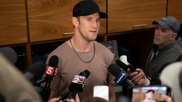 Tennessee Titans quarterback Ryan Tannehill responds to questions from the media as he and teammates clean out their lockers at Saint Thomas Sports Park Monday, Jan. 9, 2023, in Nashville, Tenn. The Tennessee Titans finished the 2022 season with 7 wins and 10 losses, missing the playoffs.