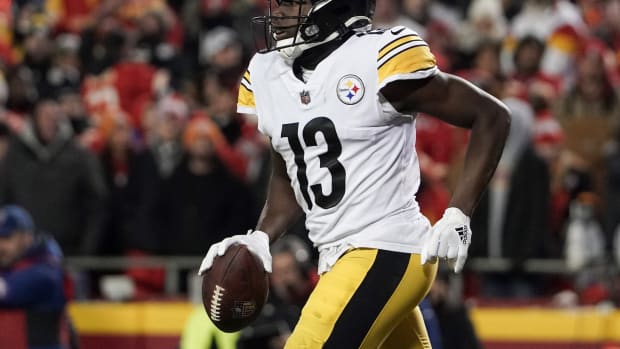 Jan 16, 2022; Kansas City, Missouri, USA; Pittsburgh Steelers wide receiver James Washington (13) returns to the sidelines after scoring against the Kansas City Chiefs in an AFC Wild Card playoff football game at GEHA Field at Arrowhead Stadium.