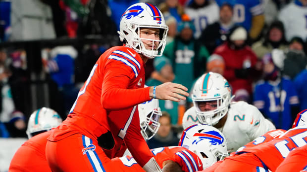 Dec 17, 2022; Orchard Park, New York, USA; Buffalo Bills quarterback Josh Allen (17) looks to the sidelines prior to the snap during the first half against the Miami Dolphins at Highmark Stadium.
